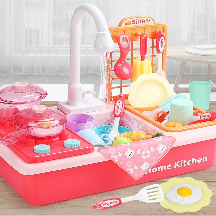 white and pink play kitchen